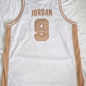 Michael Jordan's White "Nike" USA Olympic Golden Edition #9 Basketball Jersey.